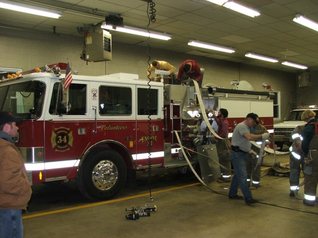 Engine 4-9-1 crew helping Martin's Corner get Engine 34-1 back into service...3/19/05